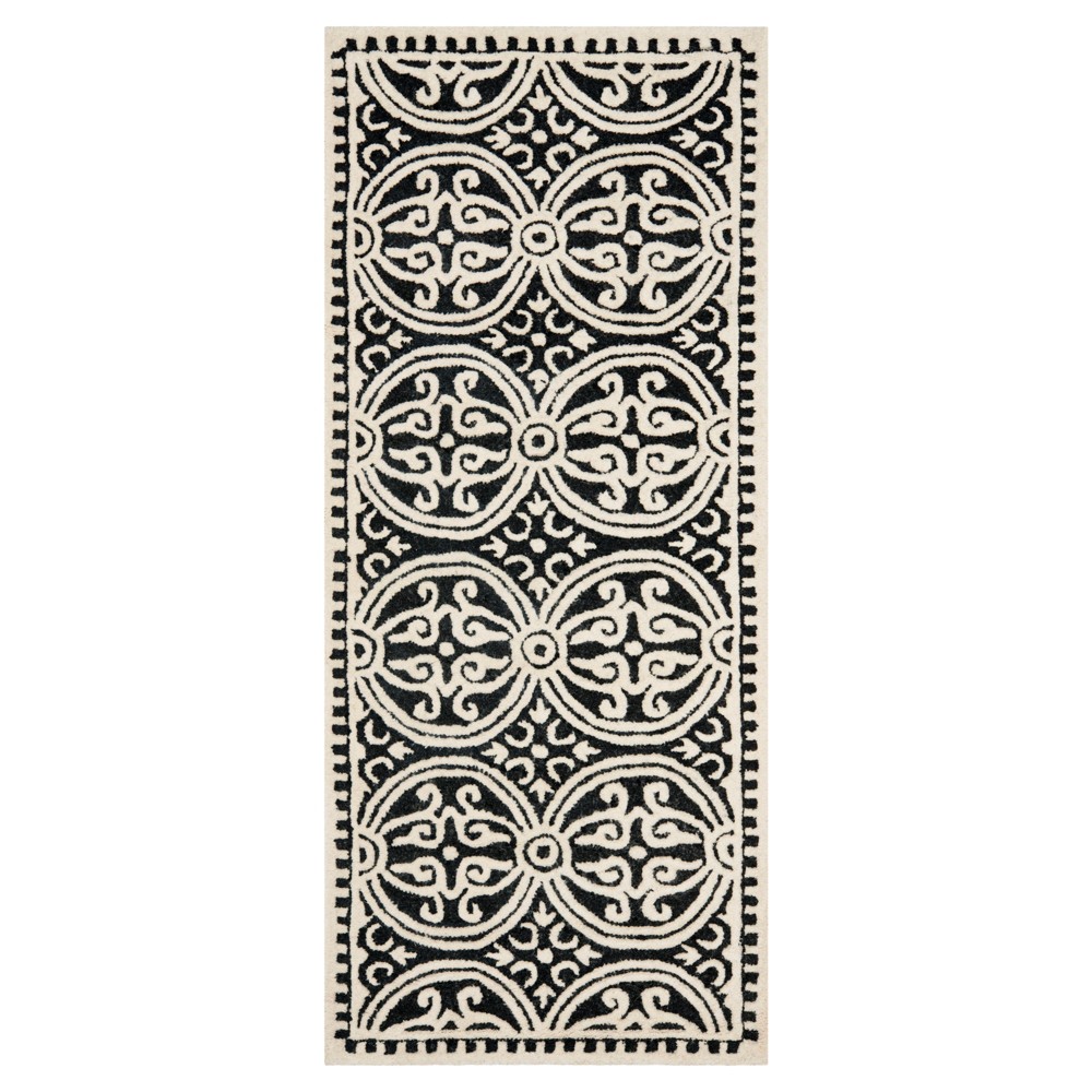 Black/Ivory Geometric Tufted Runner 2'6inX6' - Safavieh