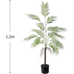 Artificial palm tree with natural trunk and realistic leaves, perfect for decorating living rooms, bedrooms, and office corners. - 1 of 4