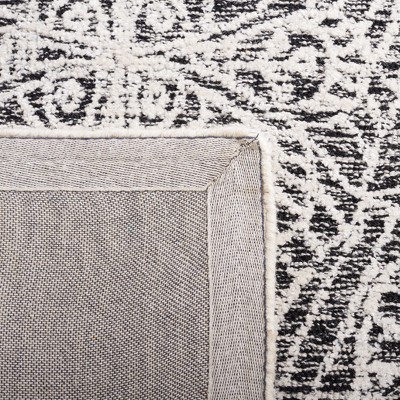 Black and Ivory Hand-Tufted Wool 4' x 6' Area Rug
