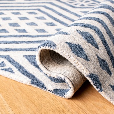 Blue and Ivory Handmade Wool 8' x 10' Area Rug