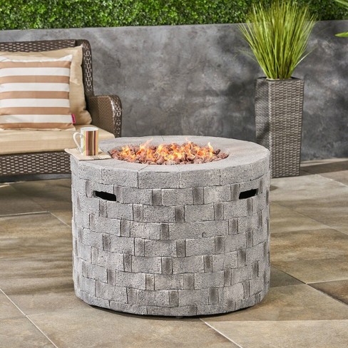 Gray concrete propane fire shop pit