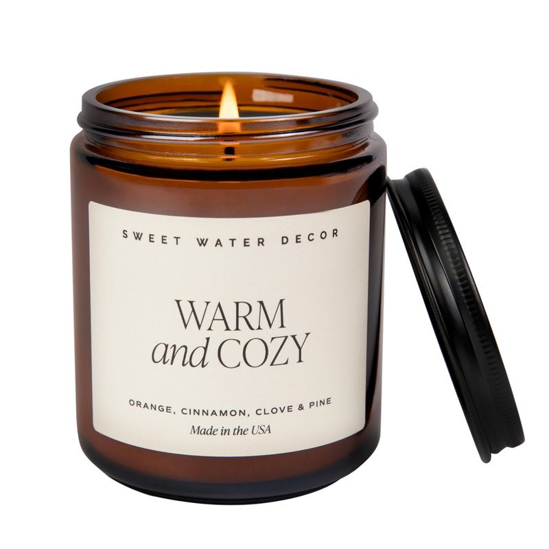 Sweet Water Decor Warm & Cozy 9oz Amber Jar Soy Candle, 1 of 4