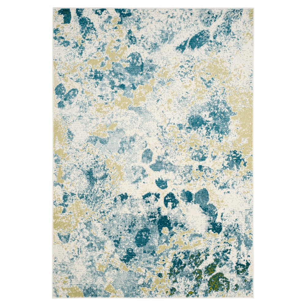6'7inx9'1in Ivory/Light Blue Splatter Loomed Area Rug - Safavieh
