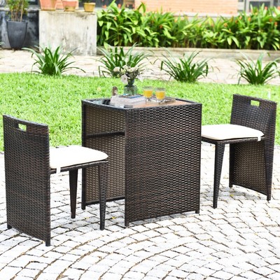 Compact Brown Wicker Outdoor Patio Set with Cushions and Glass Table