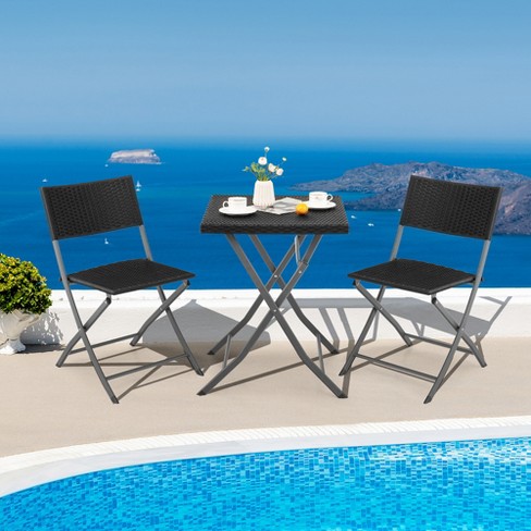 Folding rattan best sale chairs and table