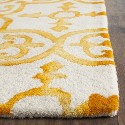 Ivory and Gold Hand-Tufted Wool Area Rug