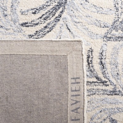 Ivory and Grey Floral Tufted Wool Area Rug 8' x 10'