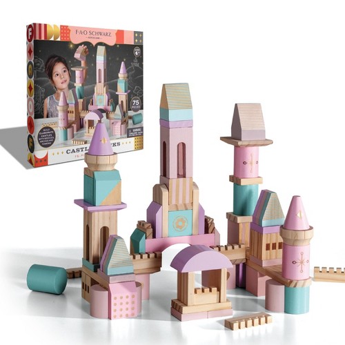 pastel wooden block set built into a medieval castle in front of the  box packaging