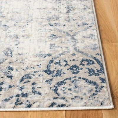 Ivory and Navy Rectangular Hand-knotted Synthetic Area Rug