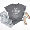 Simply Sage Market Women's Being A Mother Is Easy Short Sleeve Garment Dyed Graphic Tee - 3 of 3