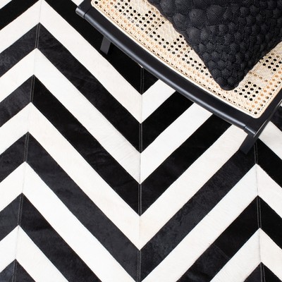 Handmade Black and White Geometric Cowhide Area Rug 4' x 6'