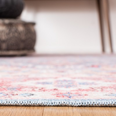 Round Blue and Rust Hand-Knotted Viscose Chenille Rug