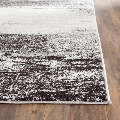 Silver and Multicolor Abstract Synthetic Area Rug