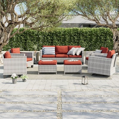 Sonkuki 8-Piece Patio Conversation Set, Outdoor Furniture Set with 4 Rattan Swivel Rocking Chairs, Side Table, Ottoman and Navy Blue Cushion