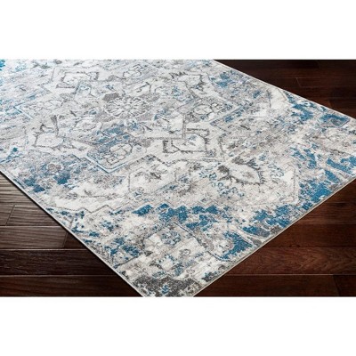 Angelo 5'3" Round Blue and Ivory Synthetic Fur Area Rug