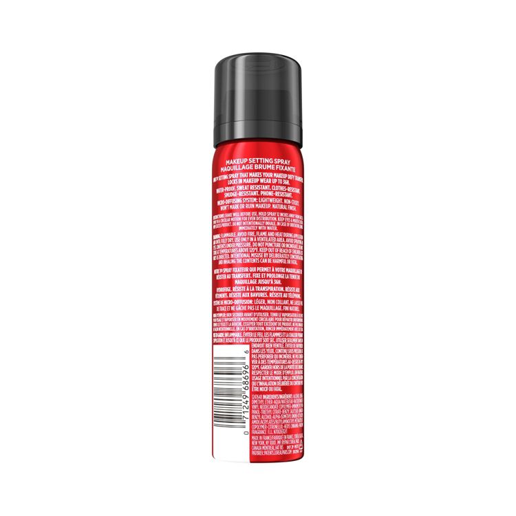 Red colored makeup setting spray can with a black cap and detailed text on the label.