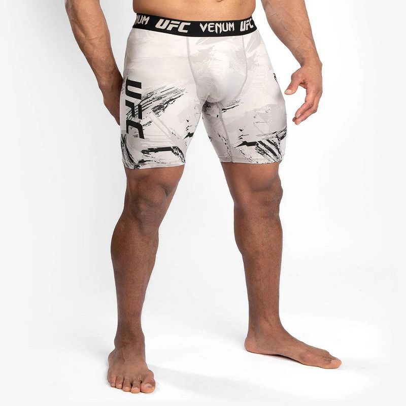 Venum UFC Authentic Fight Week 2.0 Vale Tudo Shorts - Black/Sand, 1 of 3