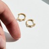 Ross-Simons 0.25 ct. t.w. Diamond Huggie Hoop Earrings in 10kt Yellow Gold - 3 of 4