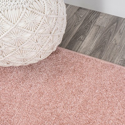 Reversible Solid Pink Synthetic 4' x 6' Easy-Care Area Rug