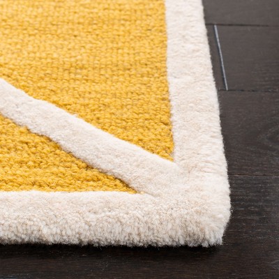 Gold and Ivory Geometric Hand-Tufted Wool Area Rug