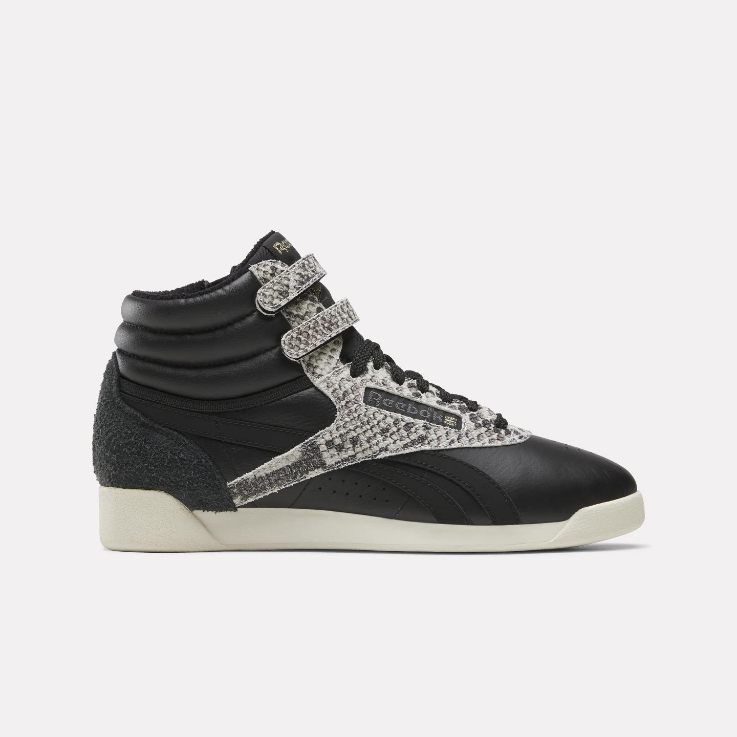 Женские кроссовки Reebok Freestyle Hi Zip Shoes Size 6 ALMOSTBLACK/VINTAGECHALK/GOLD, цвет: Золотой — фото 1