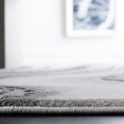 Abstract Swirls 5'3" x 7'6" Blue/Grey Synthetic Area Rug