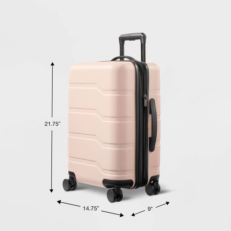 A pink colored suitcase with a telescopic handle and four wheels, measuring 21.75 inches in height, 14.75 inches in width, and 9 inches in depth.