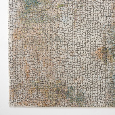 Ivory and Multicolor Abstract Round Synthetic Area Rug