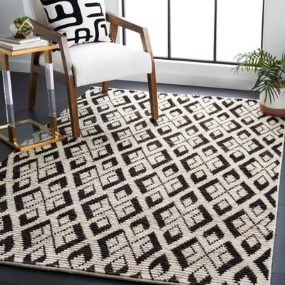 Hand-Knotted Black and Ivory Wool Area Rug, 5' x 8'