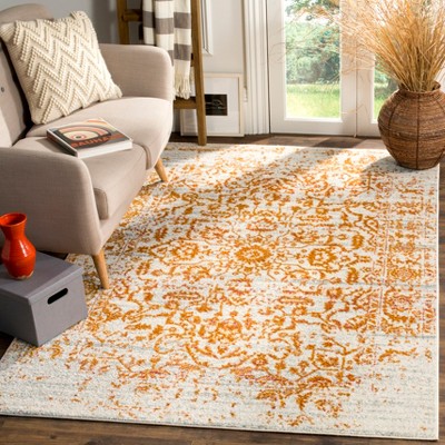 Cream and Orange 3' x 5' Synthetic Area Rug