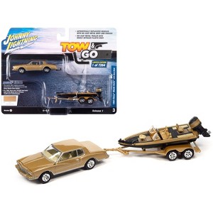1980 Chevrolet Monte Carlo Light Camel Gold Metallic with Bass Boat and Trailer 1/64 Diecast Model Car by Johnny Lightning - 1 of 3