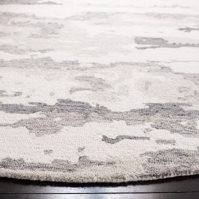 Handmade Tufted Charcoal/Ivory Round Wool Area Rug
