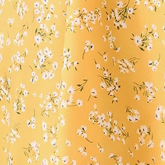 yellow background with small white flowers