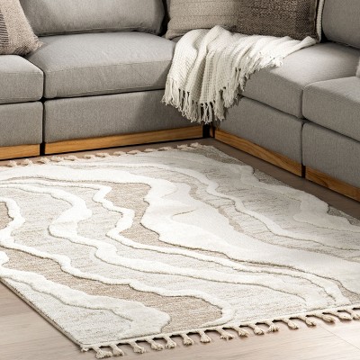 Ivory and Beige Abstract High-Low Tasseled 6'7" x 9' Area Rug