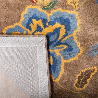 Soho Hand Tufted Floral Wool Area Rug in Brown and Multi