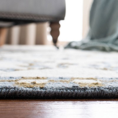 Ivory Floral Hand-Hooked Wool Rectangular Area Rug