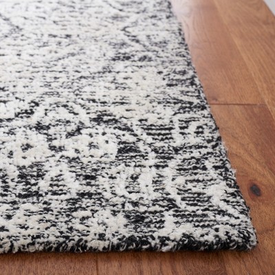 Hand-Tufted Black and Ivory Geometric Wool Rug 8' x 10'