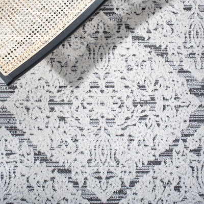 Ivory Geometric 6' x 9' Synthetic Indoor/Outdoor Area Rug