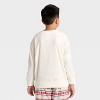 Kids' Fair Isle Microfleece Holiday Matching Family Sweatshirt - Wondershop™ Cream - 3 of 4