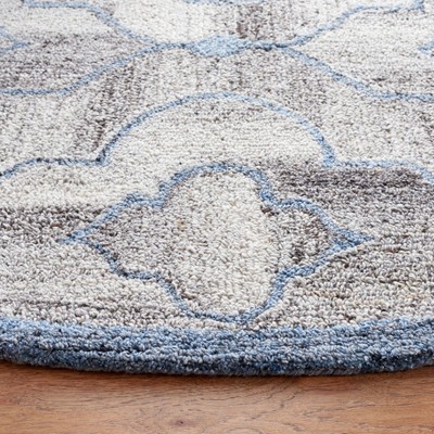 Handmade Blue and Brown Round Wool Area Rug, 6'