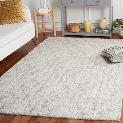 Ivory and Light Blue Tufted Wool 4' x 6' Area Rug