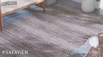 Ivory and Light Brown 8' x 10' Stain-Resistant Synthetic Area Rug