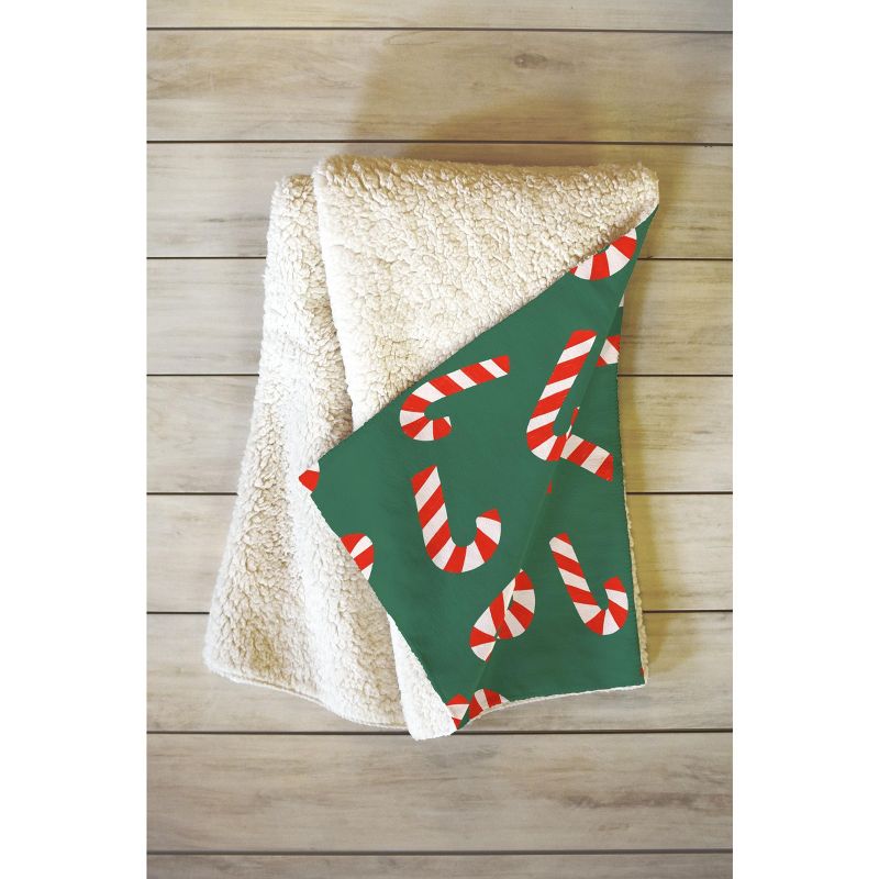 Lathe & Quill Candy Canes Green Fleece Throw Blanket -Deny Designs, 2 of 3