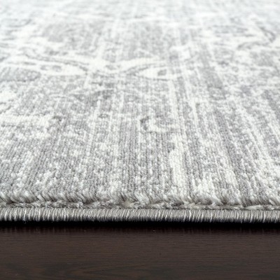 Silver 5' x 7' Distressed Oriental Synthetic Area Rug