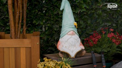 Whimsical Ceramic Gnome with Turquoise Hat Reading Book