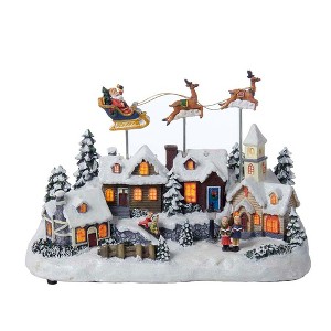 Kurt Adler 12" Battery Operated Musical LED Village with Santa and Deer - 1 of 4