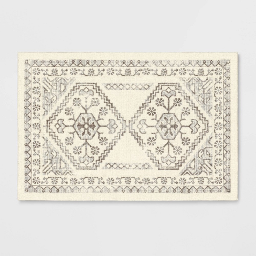 2'5inx3'8in Kensington Washable Persian Style Rug Cream - Threshold