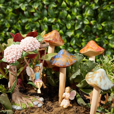 Condition photo showing New/Like New for juvale 4 pack 5-inch ceramic mushroom plant garden ornament and decor - outdoor decoration stakes for planter pots