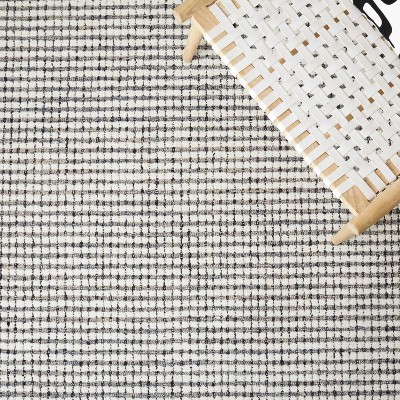 Ivory Round Handmade Tufted Wool Abstract Rug