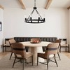 BAOURE 8-Light (No Bulbs) Matte Black Wagon Wheel Chandelier Farmhouse Modern Small Round Chandelier for Living Room Kitchen Island Foyer Hallway - 2 of 4